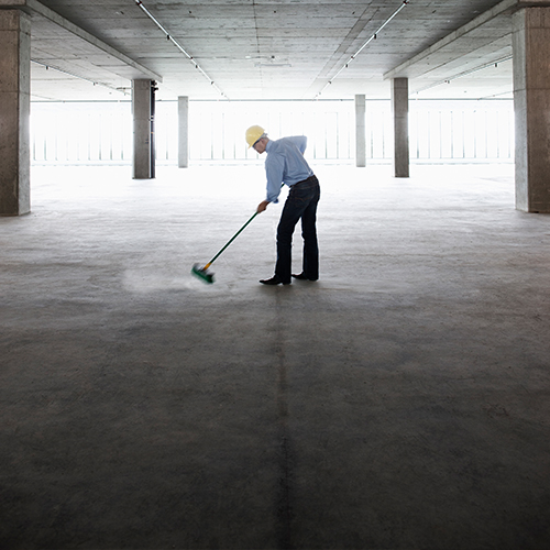 asian-businessman-cleaning-up-with-a-broom-in-a-la-2025-04-03-16-31-23-utc